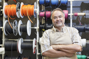 Small Business Owner Keeping Track Of Expenses